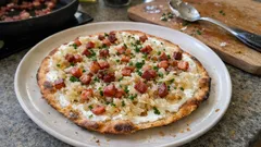 Sauerkraut-Flammkuchen mit Speck: so wird der Boden richtig knusprig